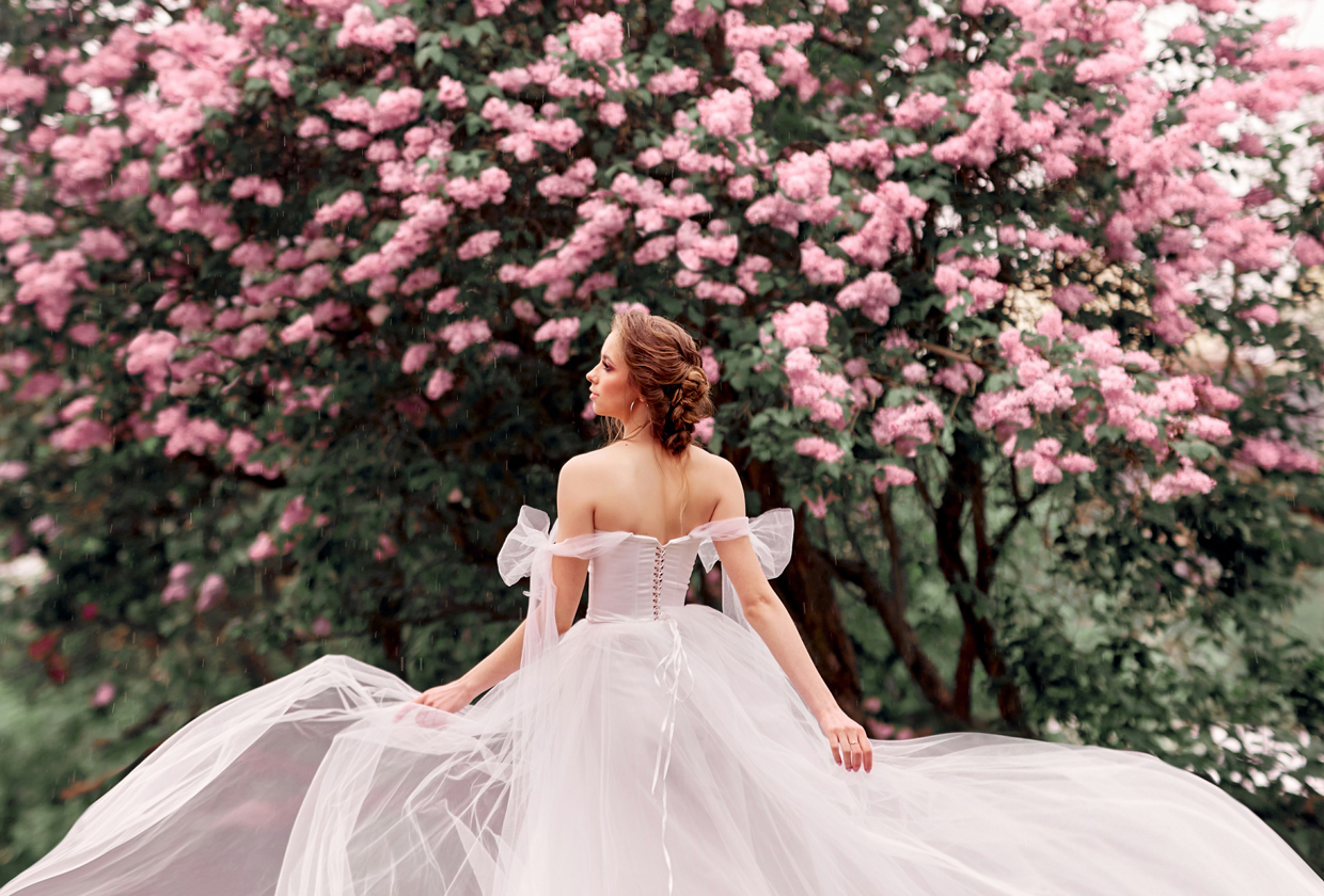 bride wearing floaty pin dress